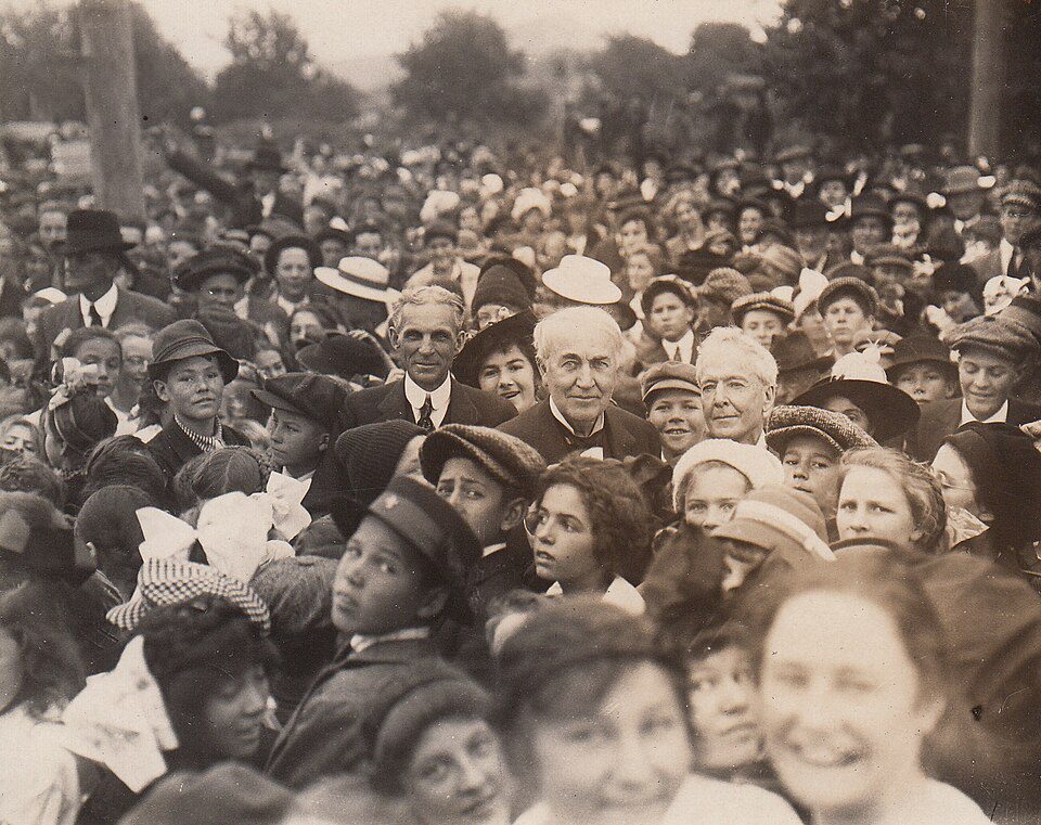 Henry Ford, Thomas Edison, and Luther Burbank surrounded by a massive crowd in Santa Rosa, 1915
